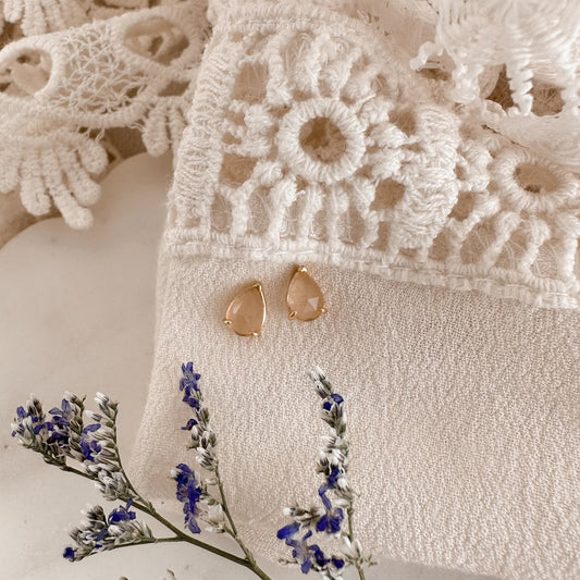 Peach teardrop studs - gold