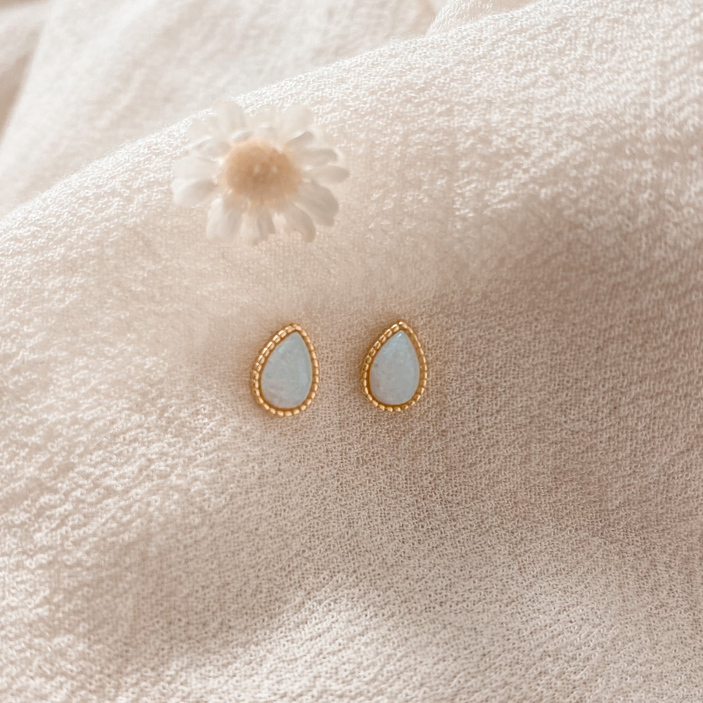 Opal teardrop studs