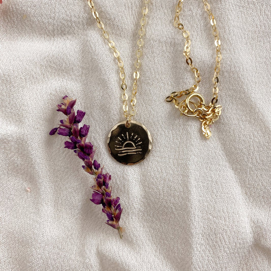Rising sun necklace