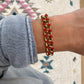 Red enamel curb chain bracelet - gold