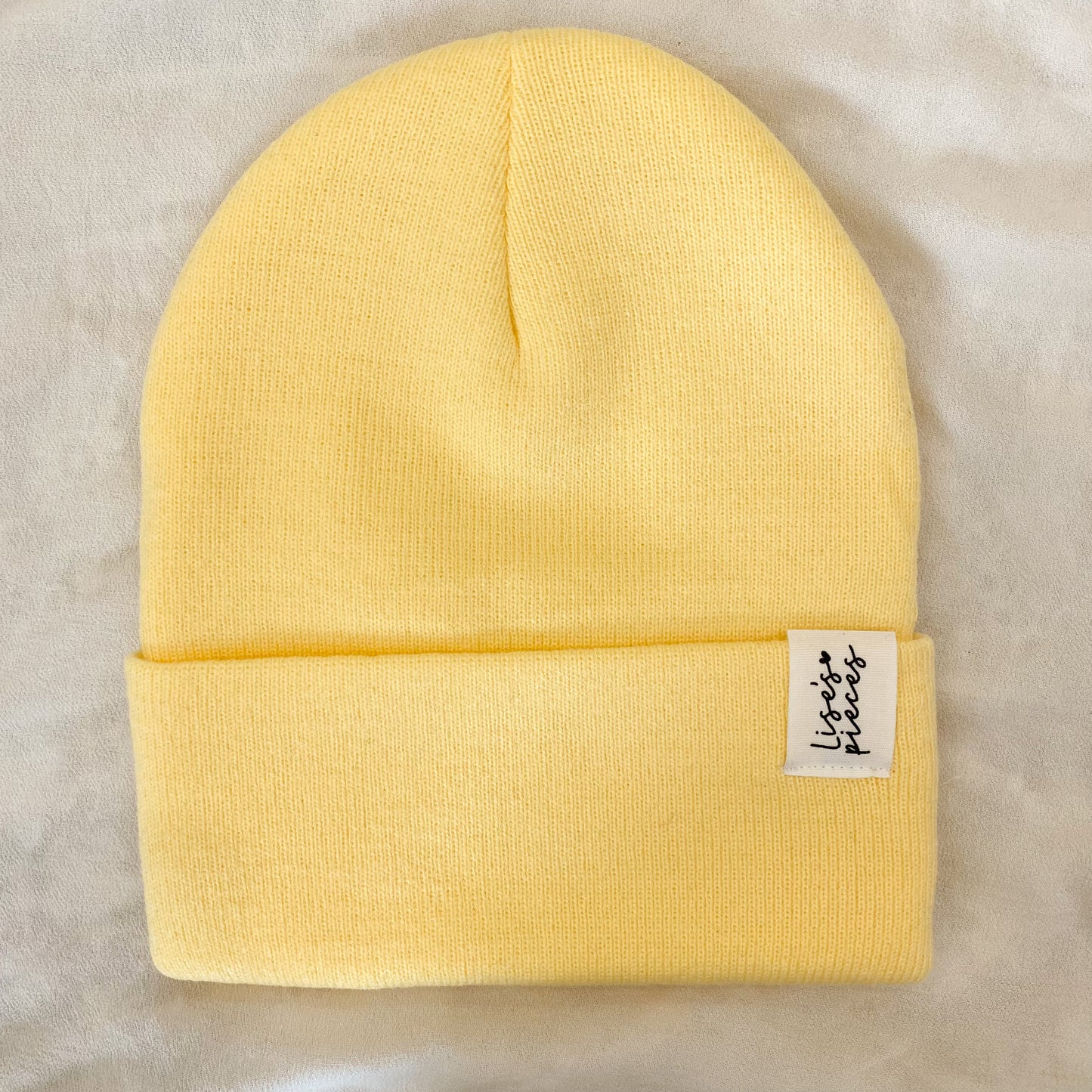 Pale yellow toque